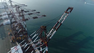 big crane on the shore cranes cargo port sea